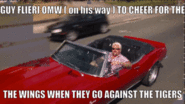 gif saying "Guy Flieri OMW (on his way) to cheer for the the Wings when they go against the Tigers"