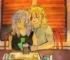 A digital drawing of two women with light skin and curly hair sitting at a diner counter. One has purple hair and a stylized blank expression with just her eyes visible, and she is sitting stiffly in a chair. The other has her arm around the first woman, she has blonde hair and is smiling wistfully and offering her a cup of macchiato coffee. They’re both sitting in red diner chairs in front of a window with orange shades over it. Outside is a dark and foreboding storm. The women both have dial pad buttons on their faces but on opposite sides.