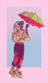 Lou Roseheart with flame pants and a green and orange umbrella.png