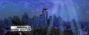 A picture of the Seattle skyline with water drawn over it. A sign reads "Welcome to Shark Seattle."